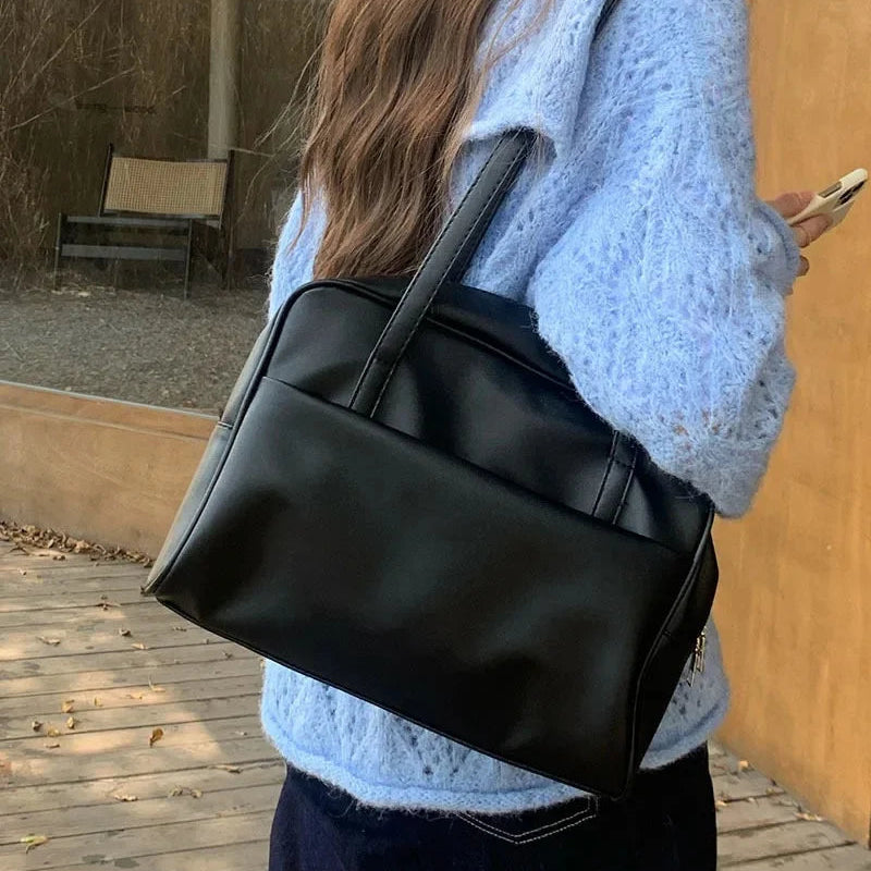 Prosta torba na ramię z kieszonką