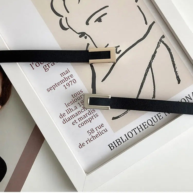 Elegancki pasek z ozdobną prostokątną klamerką