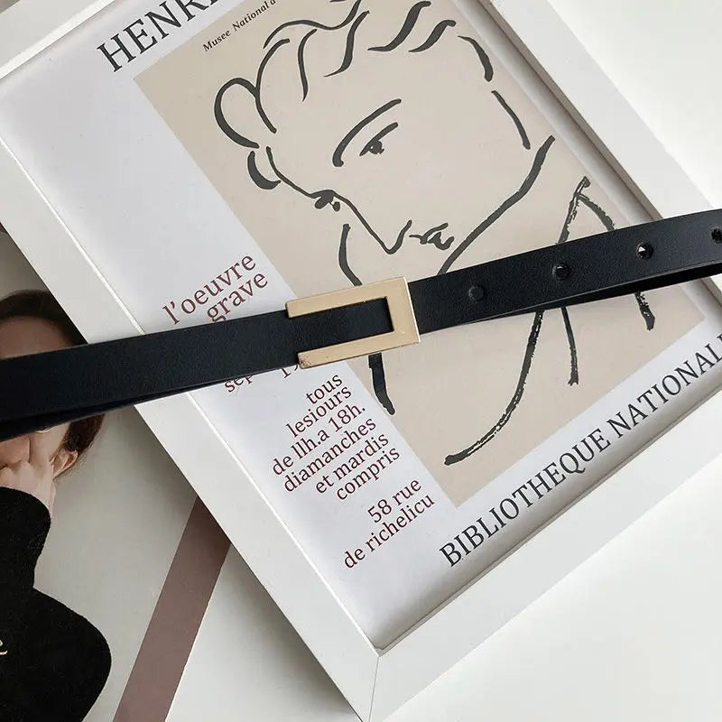 Elegancki pasek z ozdobną prostokątną klamerką