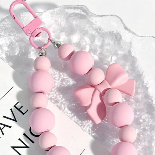 Zawieszka różowe koraliki z kokardką