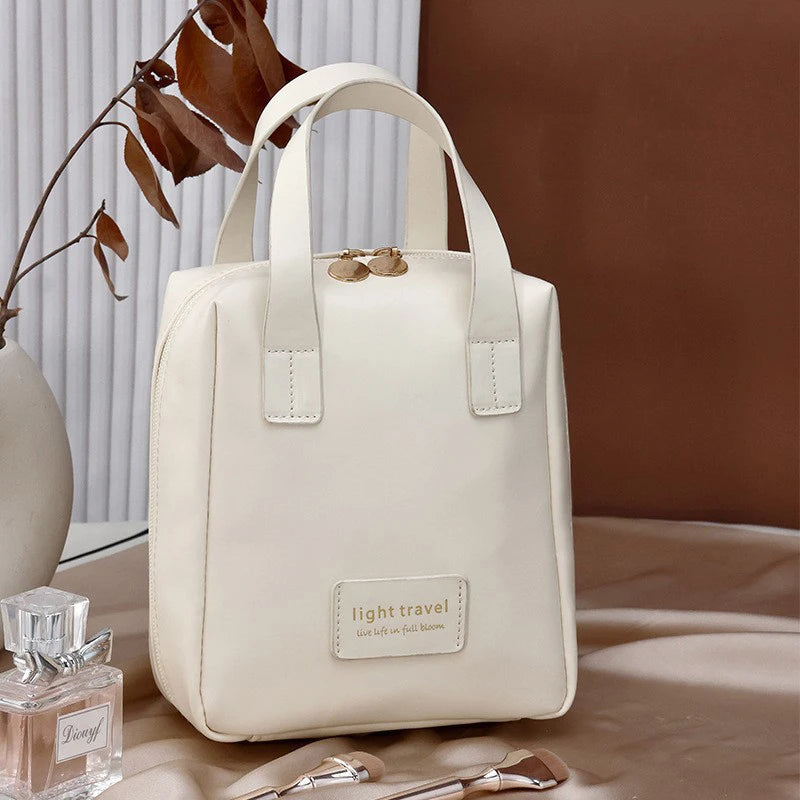 Kosmetyczka o dużej pojemności z uchwytem na rękę