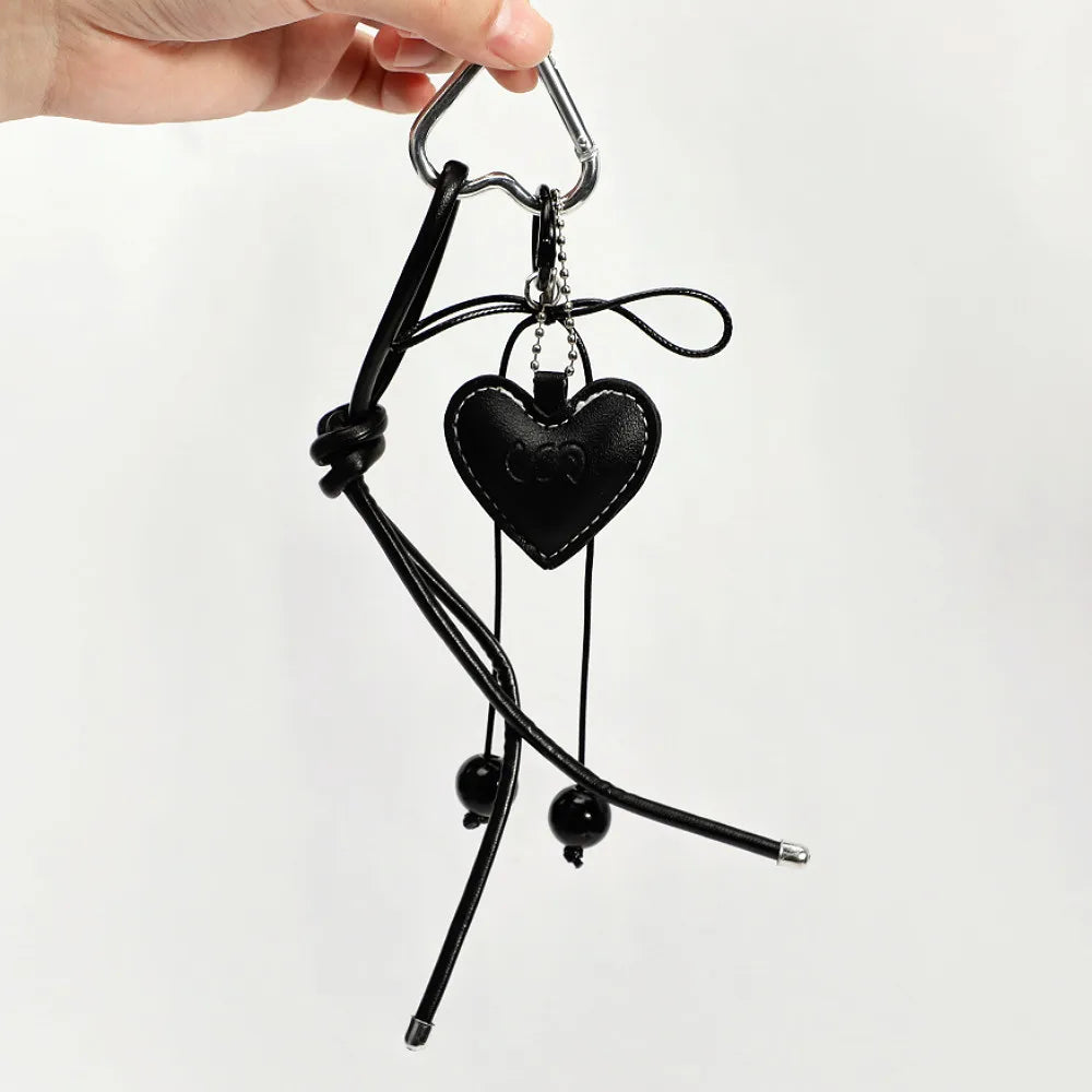 Zawieszka serduszko ze sznurkiem i kokardką