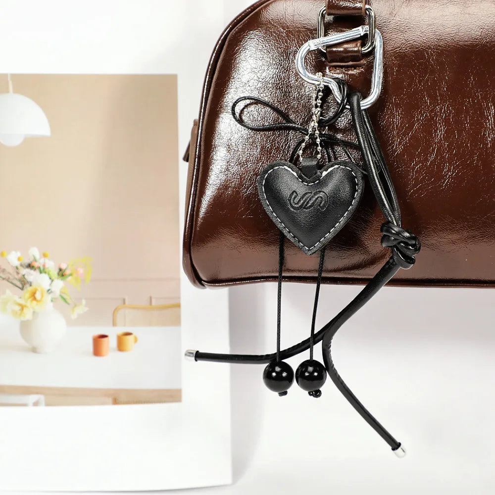 Zawieszka serduszko ze sznurkiem i kokardką