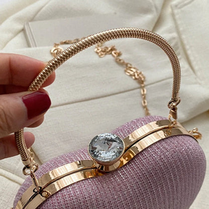 Błyszcząca kopertówka na łańcuszku w kształcie serca